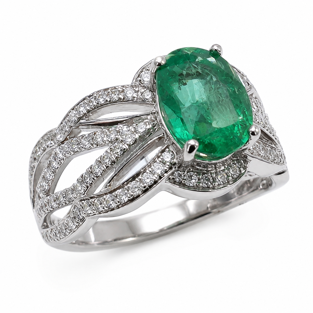 D33 ANILLO ESMERALDA OVAL ORO BLANCO 18